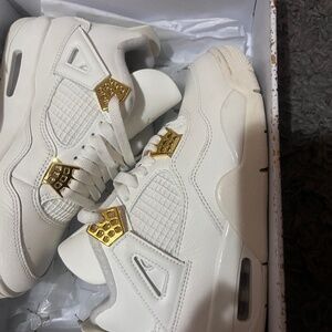 Jordan 4 metallic gold